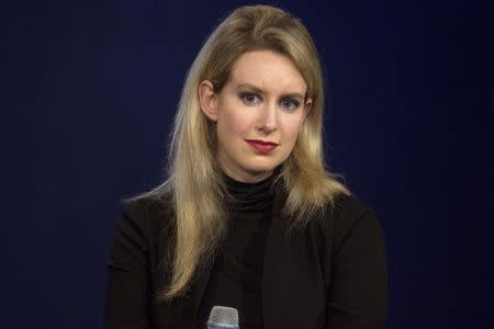 FILE PHOTO: Elizabeth Holmes, CEO of Theranos, attends a panel discussion during the Clinton Global Initiative's annual meeting in New York, September 29, 2015. REUTERS/Brendan McDermid/File Photo