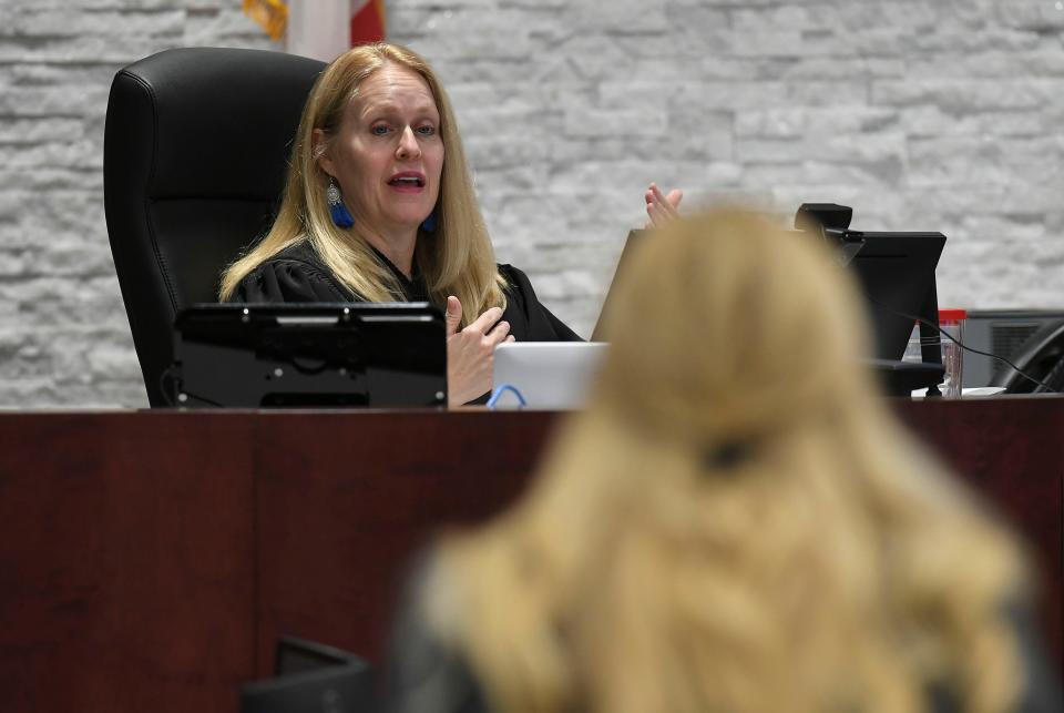 Circuit Judge Laurie Buchanan (top) talks with Lauren Frieder representing the Vero Beach Preservation Alliance, during the trial between the Alliance and the City of Vero Beach at the Indian River County Courthouse on Friday, Nov. 4, 2022, in Vero Beach. The city is arguing whether to remove the VBPA's marina/parks referendum from the city's Nov. 8 ballot.