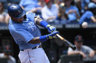 Kansas City Royals' Salvador Perez hits a two-run home run during the third inning of a baseball game against the Detroit Tigers in Kansas City, Mo., Wednesday, June 16, 2021. (AP Photo/Reed Hoffmann)