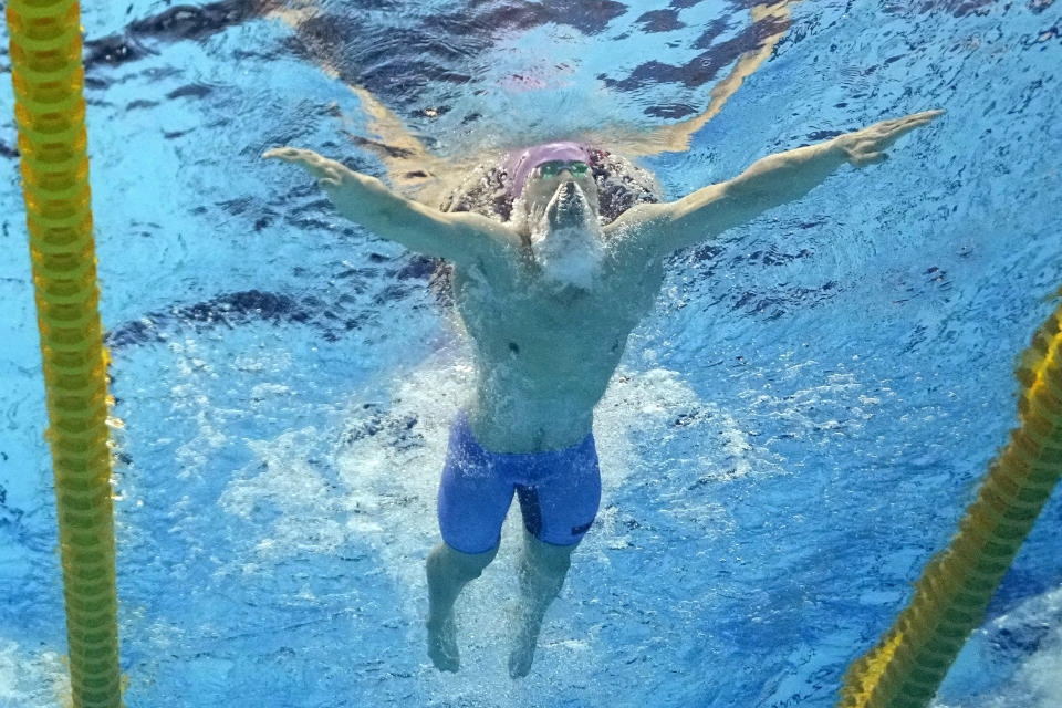 Qin Haiyang, of China, competes in the men's 200-meter breaststroke final at the World Swimming Championships in Fukuoka, Japan, Friday, July 28, 2023. Qin finished first. (AP Photo/David J. Phillip)