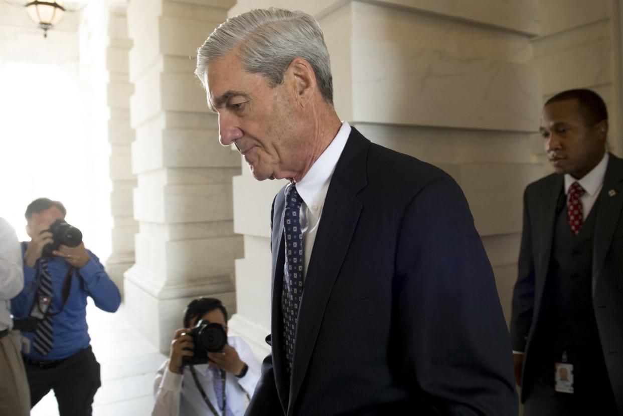 Special Prosecutor Robert Mueller told President Donald Trump's attorneys the president is not a criminal target in the Russia probe, but remains the subject of the investigation: SAUL LOEB/AFP/Getty Images