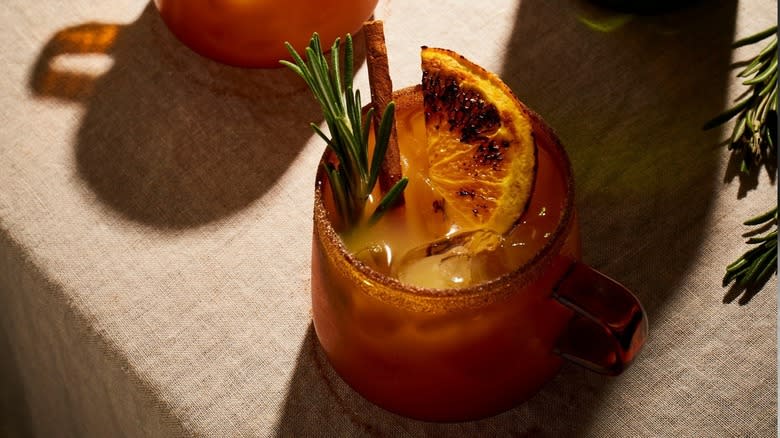 cocktail topped with brûléed fruit