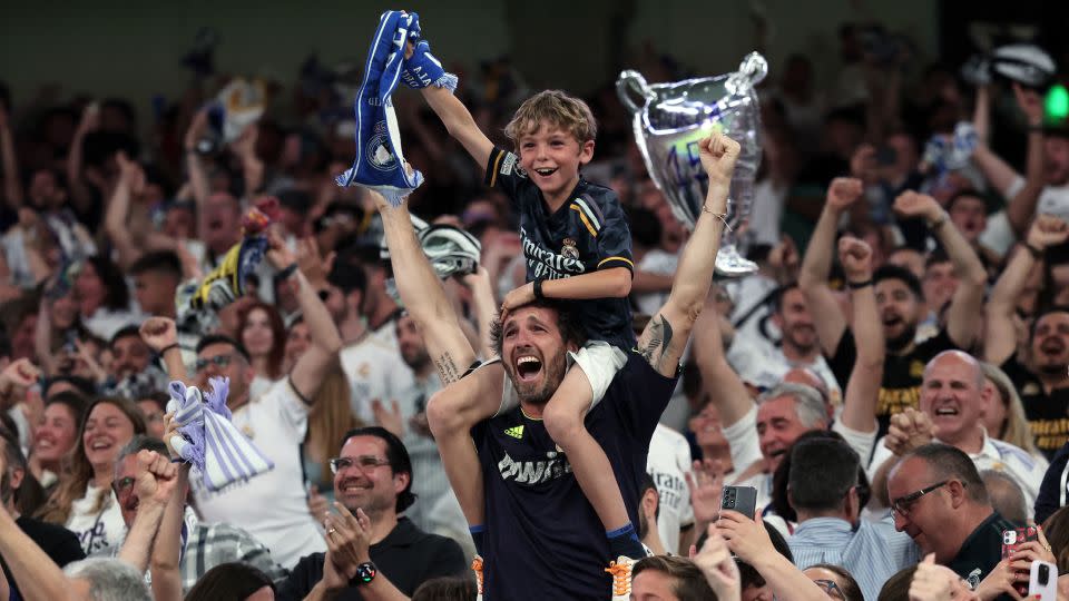 Real Madrid fans celebrate during the Champions League final against Borussia Dortmund. - Thomas Coex/AFP/Getty Images