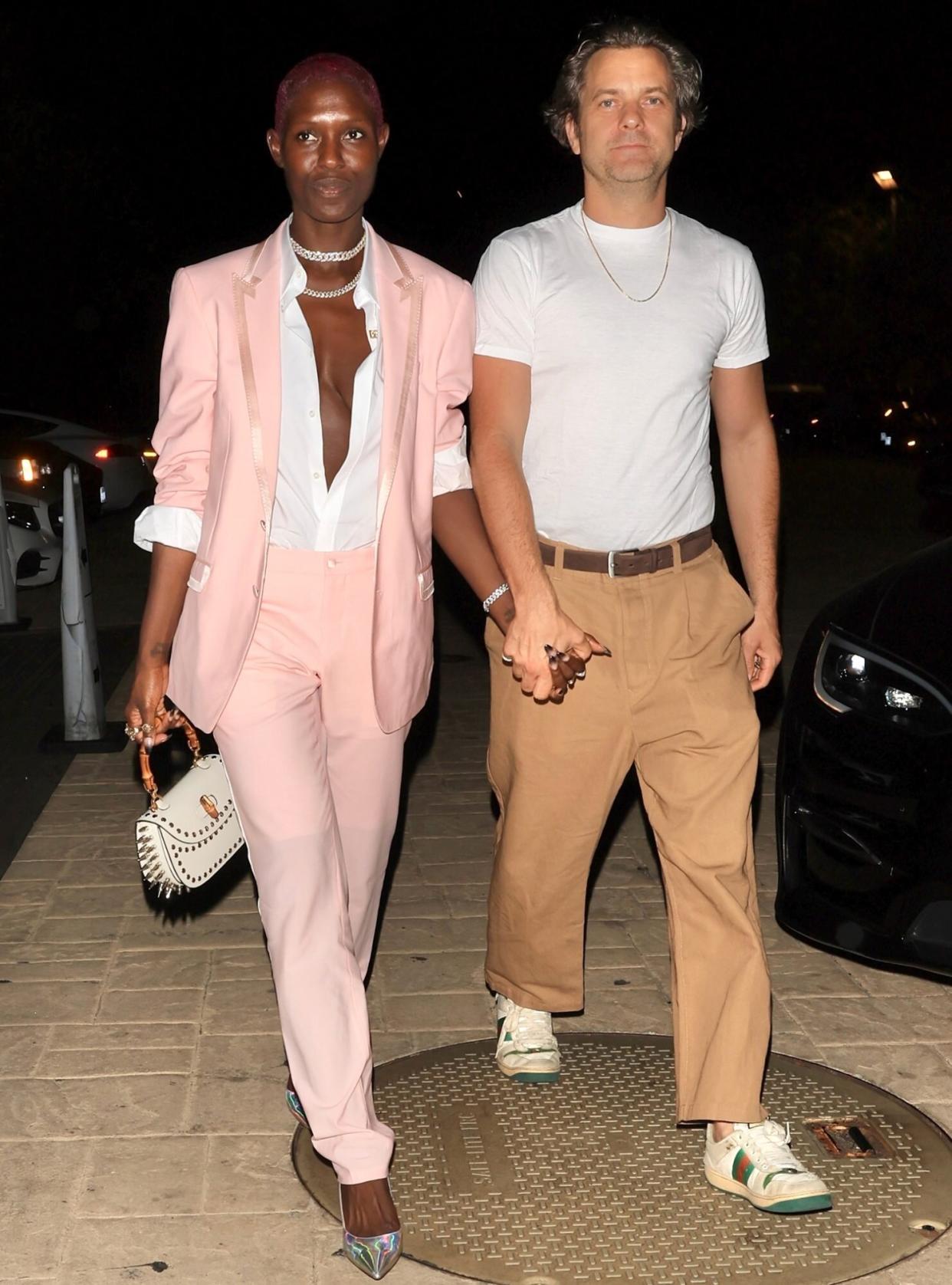 Jodie Turner-Smith and her husband Joshua Jackson squash break-up rumors as they are seen holding hands while arriving for a dinner date at Nobu