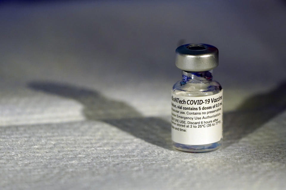 A vial of Pfizer's COVID-19 vaccine that receivedemergency use authorization is seen at George Washington University Hospital, Monday, Dec. 14, 2020, in Washington. (AP Photo/Jacquelyn Martin, Pool)