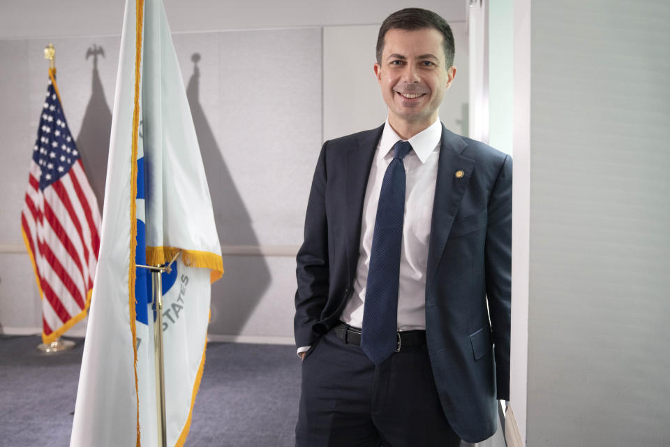 Transportation Secretary Pete Buttigieg poses for a portrait, Wednesday, May 10, 2023, at the Department of Transportation in Washington. Buttigieg says Tesla shouldn’t call its partially automated driving system Autopilot because the cars can’t drive themselves.(AP Photo/Jacquelyn Martin)