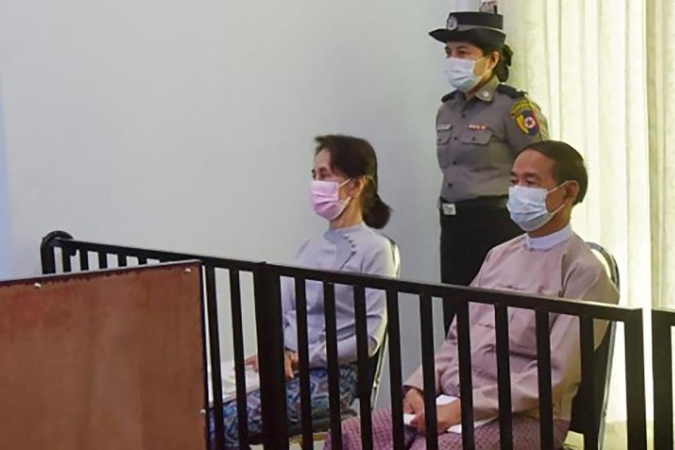Aung San Suu Kyi and Win Myint during their first court appearance in Naypyidaw, on 24 May 2021 (Myanmar Ministry of Information)