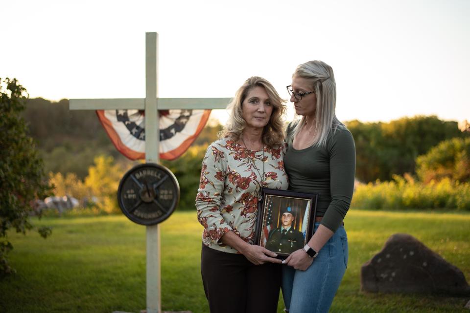 In this 2019 file photo, Jill Richardson Perez and her daughter, Ashleigh Coons, mourn Perez's son Matthew Coons, one of 20 people killed in a limousine crash in Schoharie, N.Y., on Oct. 6, 2018.