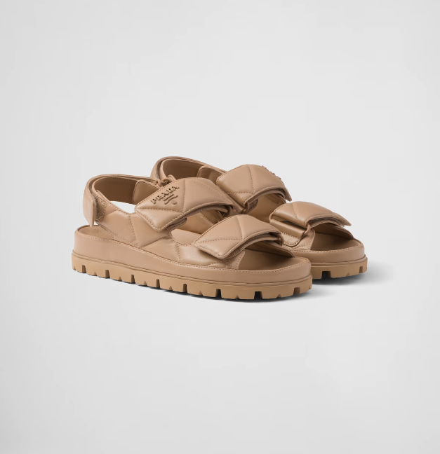 <p><a href="https://go.redirectingat.com?id=74968X1596630&url=https%3A%2F%2Fwww.prada.com%2Fus%2Fen%2Fp%2Fpadded-nappa-leather-sandals%2F1X721M_038_F0036_F_D020%3Fs_kwcid%3DAL%25218549%25213%2521%2521%2521%2521x%2521%2521%26gad_source%3D1%26gclid%3DCjwKCAiA6KWvBhAREiwAFPZM7tv9i_dl4-XTHTQT5ePZFmU3-Q-emaMIai-P-csi2gkVaf_f_cHc8hoCZokQAvD_BwE%26gclsrc%3Daw.ds&sref=https%3A%2F%2Fwww.harpersbazaar.com%2Ffashion%2Ftrends%2Fg43238897%2Fbest-comfortable-walking-sandals%2F" rel="nofollow noopener" target="_blank" data-ylk="slk:Shop Now;elm:context_link;itc:0;sec:content-canvas" class="link ">Shop Now</a></p><p>Padded Sandals</p><p>prada.com</p><p>$1290.00</p><span class="copyright">Prada</span>