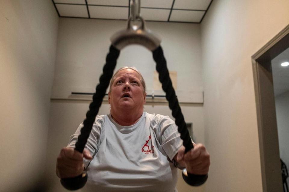 Cindy Jackson, age 63, uses an air resistance machine at Push Pull Resistance Training for Seniors. The gym offers personalized strength training workouts with air resistance machines to help seniors stay active. February 3, 2023.