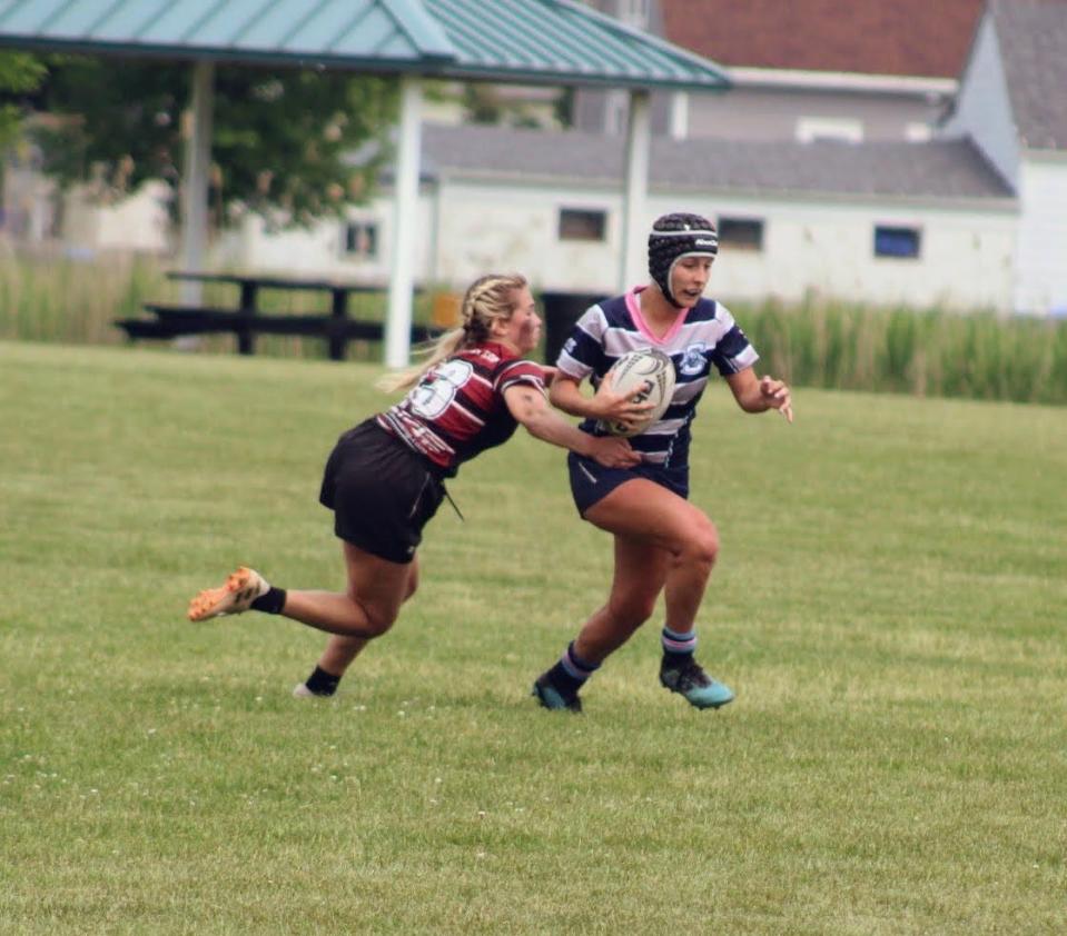 Josie Loeber of the Corning Rugby Club runs with the ball in a 22-20 win over Orchard Park in the state final June 4, 2023 at Tim Russert Park in Buffalo.