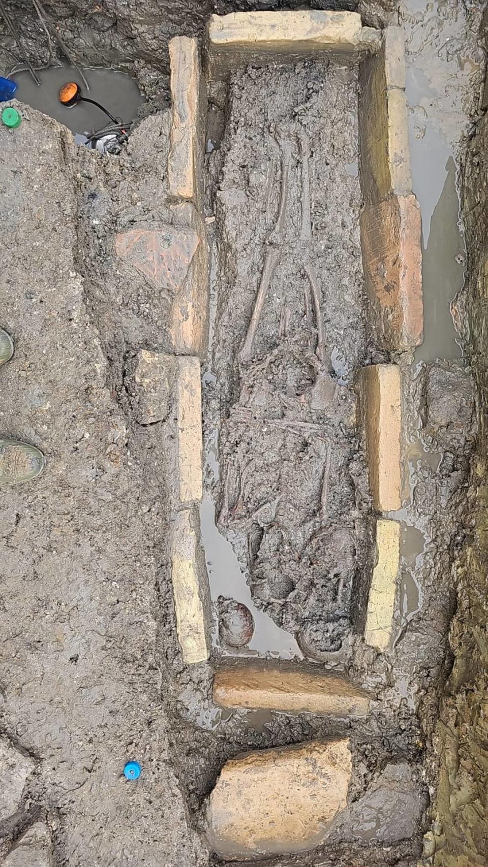 The stone tomb unearthed in the Piazza San Marco.