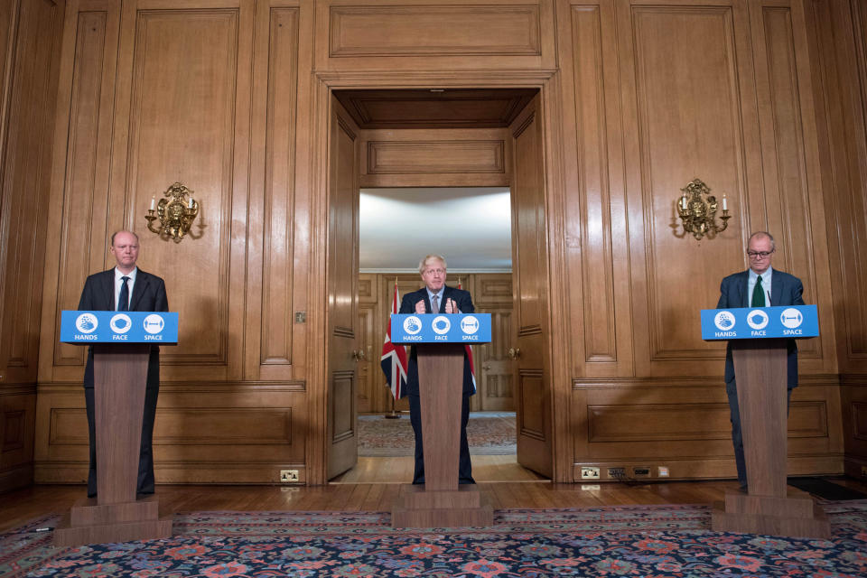 Chief Medical Officer Professor Chris Witty, Prime Minister Boris Johnson and Chief Scientific Adviser Sir Patrick Vallance during the press conference where further lockdown measures were announced. (PA)