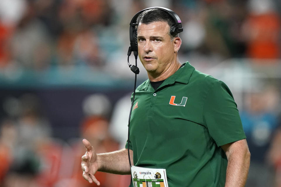 Miami head coach Mario Cristobal watches during the first half of an NCAA college football game against Florida State, Saturday, Nov. 5, 2022, in Miami Gardens, Fla.(AP Photo/Lynne Sladky)