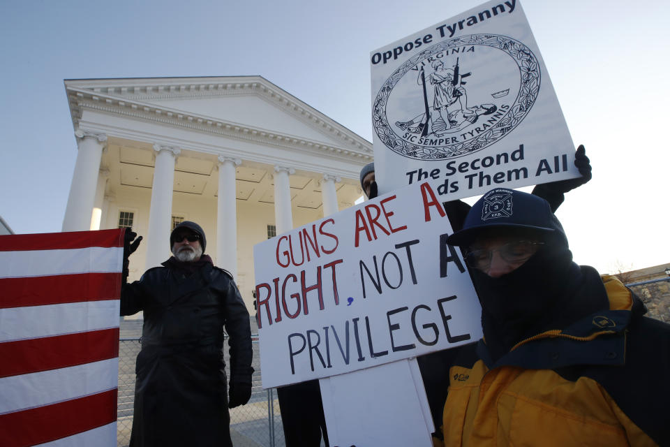 Gun-rights supporters demonstrate in front of state Capitol in Richmond, Va., Monday morning Jan. 20, 2020. Gun-rights activists and other groups are descending on Virginia’s capital city of Richmond to protest plans by the state's Democratic leadership to pass gun-control legislation. (AP Photo/Steve Helber)