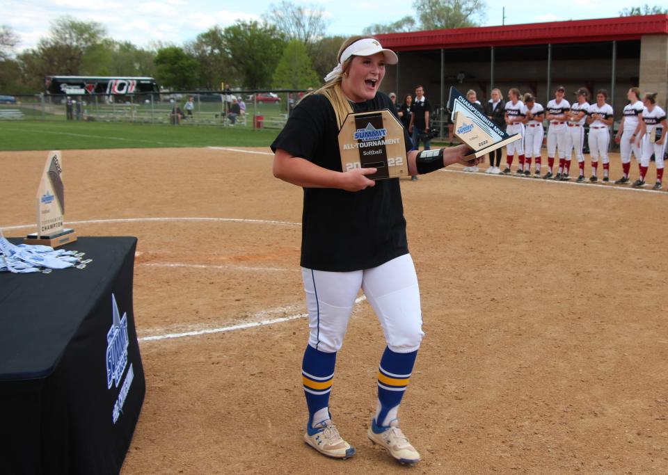 Tori Kniesche of South Dakota State holds her Summit League tournament MVP award and all-tournament team award after pitching a shutout in the championship game over Omaha. Kniesche had 16 strikeouts in the game.