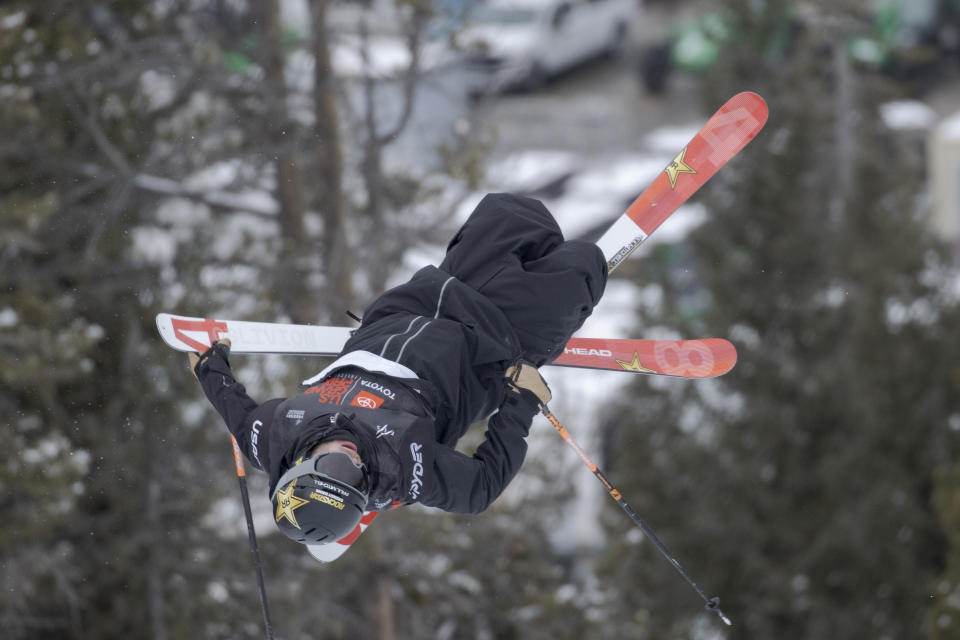 FILE - Aaron Blunck, of the United States, makes a run during halfpipe qualifying Wednesday, Dec. 8, 2021, at the U.S. Grand Prix freestyle skiing event at Copper Mountain, Colo. In a crash a year ago, Blunck lacerated his kidney, broke ribs, fractured his pelvis and bruised his heart. He's now a medal contender. (AP Photo/Hugh Carey, File)