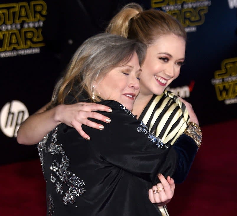 Closeup of Carrie Fisher and Billie Lourd hugging each other