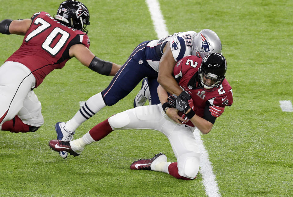 Matt Ryan is sacked by Trey Flowers in the fourth quarter of Super Bowl LI. The 28-3 taunts are still here. (Getty Images).