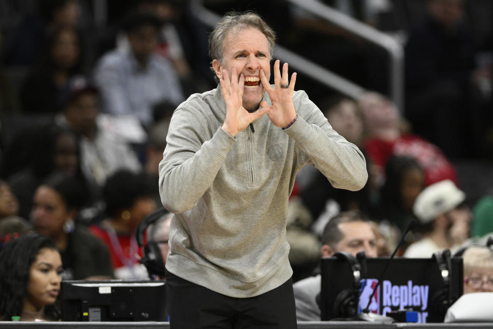 Washington Wizards interim coach Brian Keefe shouts during the first half of the team's NBA basketball game against the Detroit Pistons, Friday, March 29, 2024, in Washington. (AP Photo/Nick Wass)