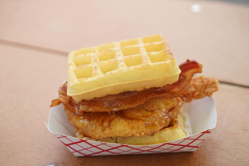 A Hor Chix and Waffles sandwich burger from the Hot Chix food stall at the Delaware State Fair on July 20, 2023.