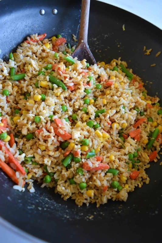 <p>Hint of Healthy</p><p>Egg-fried brown rice is an easy main or side dish. Leftover brown rice is stir-fried with vegetables and eggs to create healthy, filling street food.</p><p><strong>Get the recipe: <a href="https://www.hintofhealthy.com/egg-fried-brown-rice/" rel="nofollow noopener" target="_blank" data-ylk="slk:Egg-Fried Brown Rice;elm:context_link;itc:0;sec:content-canvas" class="link rapid-noclick-resp">Egg-Fried Brown Rice</a></strong></p>