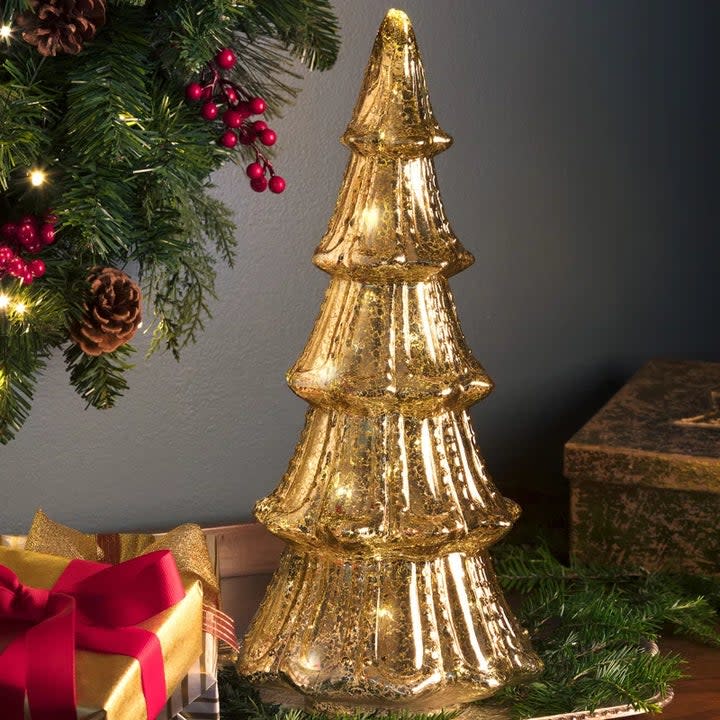 the lit tree in gold