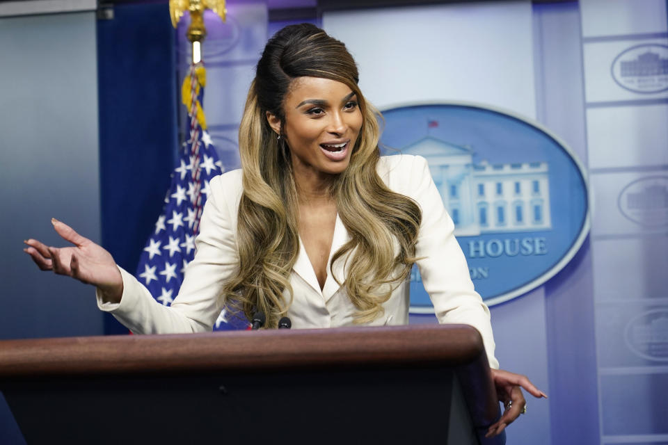 Singer Ciara poses for photos in the Brady press briefing room of the White House in Washington, Wednesday, Nov. 17, 2021. Ciara visited the White House to promote COVID-19 vaccinations for young children. (AP Photo/Susan Walsh)