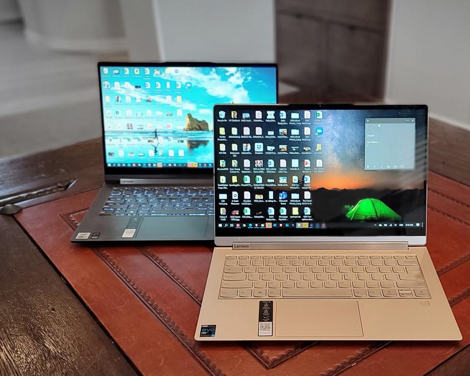 Lenovo's Yoga 9i in front and Yoga C940 in the back.