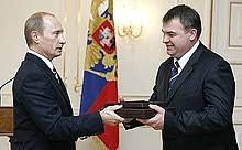 Putin and Russian Defense Minister.jpg: Russian President Vladimir Putin in 2007 bestowed Koval with Russia’s highest civilian honor, the Hero of the Russian Federation gold medal, for his role in the making of the first Soviet atomic bomb detonated in 1949. In presenting Koval’s posthumous award to Russia’s defense minister, Putin proclaimed that Koval was “the only Soviet intelligence officer to penetrate the U.S. secret atomic facilities producing the plutonium, enriched uranium and polonium used to create the atomic bomb.”