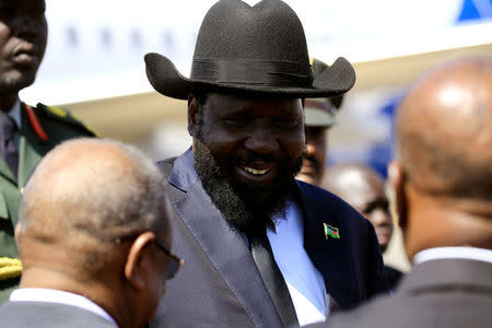 FILE PHOTO: South Sudan's President Salva Kiir Mayardit smiles upon arrival at Khartoum airport, Sudan November 1,2017. REUTERS/Mohamed Nureldin Abdallah/File Photo