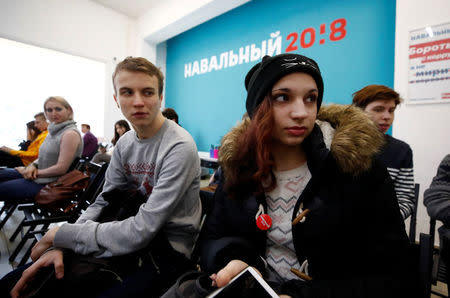 Activists and supporters of Russian opposition leader Alexei Navalny attend a masterclass, dedicated to Navalny's campaign for a boycott of the upcoming presidential election, in Moscow, Russia February 10, 2018. Picture taken February 10, 2018. REUTERS/Maxim Shemetov