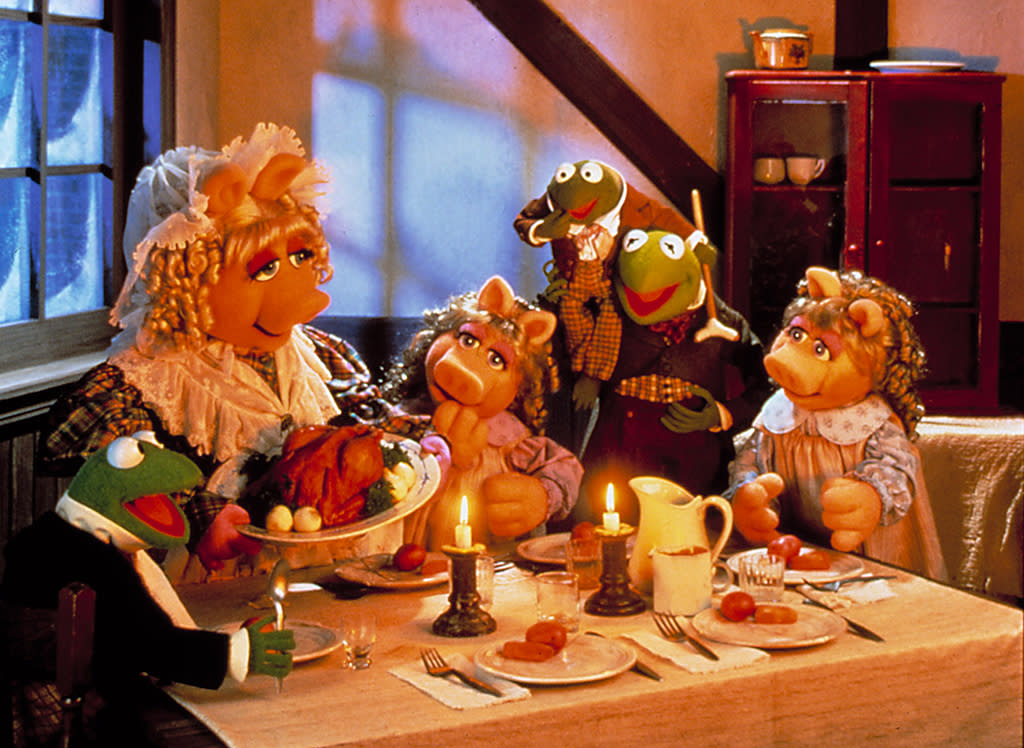 No humbuggery here: Miss Piggy, Kermit, and the gang sing the praises of Xmas  in the Muppet Christmas Carol. (Photo: Disney)