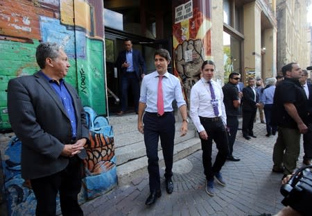 Canada's Prime Minister Justin Trudeau leaves a coffee shop prior to an election campaign stop in Winnipeg
