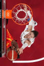 <p>Spain's Astou Ndour (L) and South Korea's Kim Danbi fight for the rebound in the women's preliminary round group A basketball match between South Korea and Spain during the Tokyo 2020 Olympic Games at the Saitama Super Arena in Saitama on July 26, 2021. (Photo by Brian SNYDER / POOL / AFP)</p> 