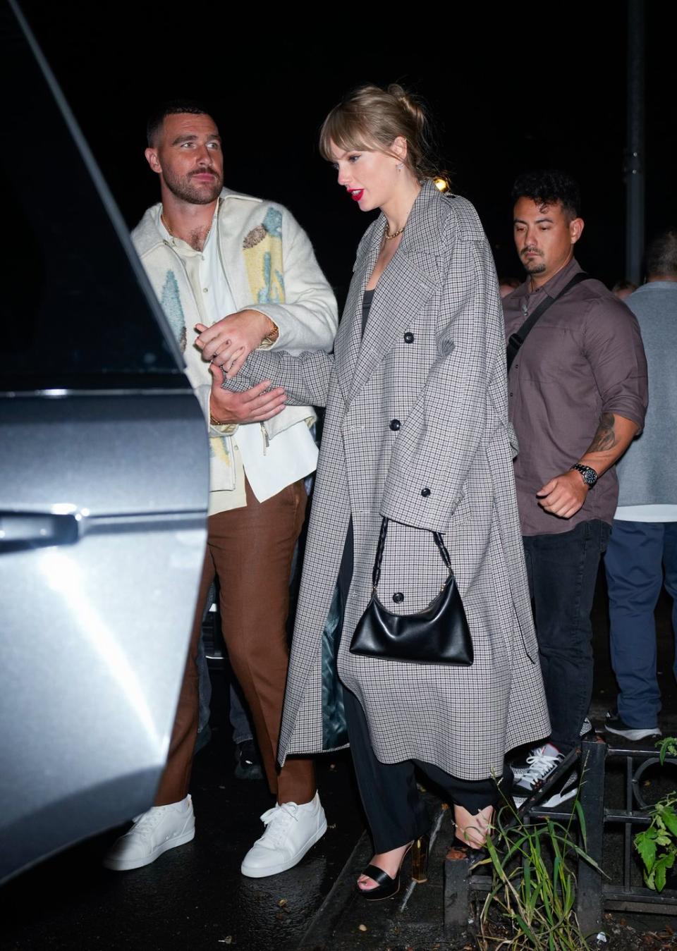 new york, new york october 15 travis kelce and taylor swift depart the snl afterparty on october 15, 2023 in new york city photo by gothamgc images