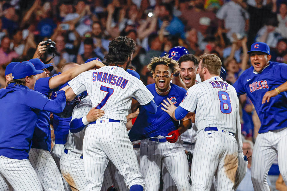 Aug 16, 2023; Chicago, Illinois, USA; Chicago Cubs second baseman Christopher Morel (5) celebrates with teammates after hitting a three-run walk-off home run against the Chicago White Sox during the ninth inning at Wrigley Field. Mandatory Credit: Kamil Krzaczynski-USA TODAY Sports