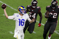 Los Angeles Rams quarterback Jared Goff (16) throws a pass as he is pressured by Tampa Bay Buccaneers inside linebacker Lavonte David (54) and defensive end William Gholston (92) during the first half of an NFL football game Monday, Nov. 23, 2020, in Tampa, Fla. (AP Photo/Mark LoMoglio)