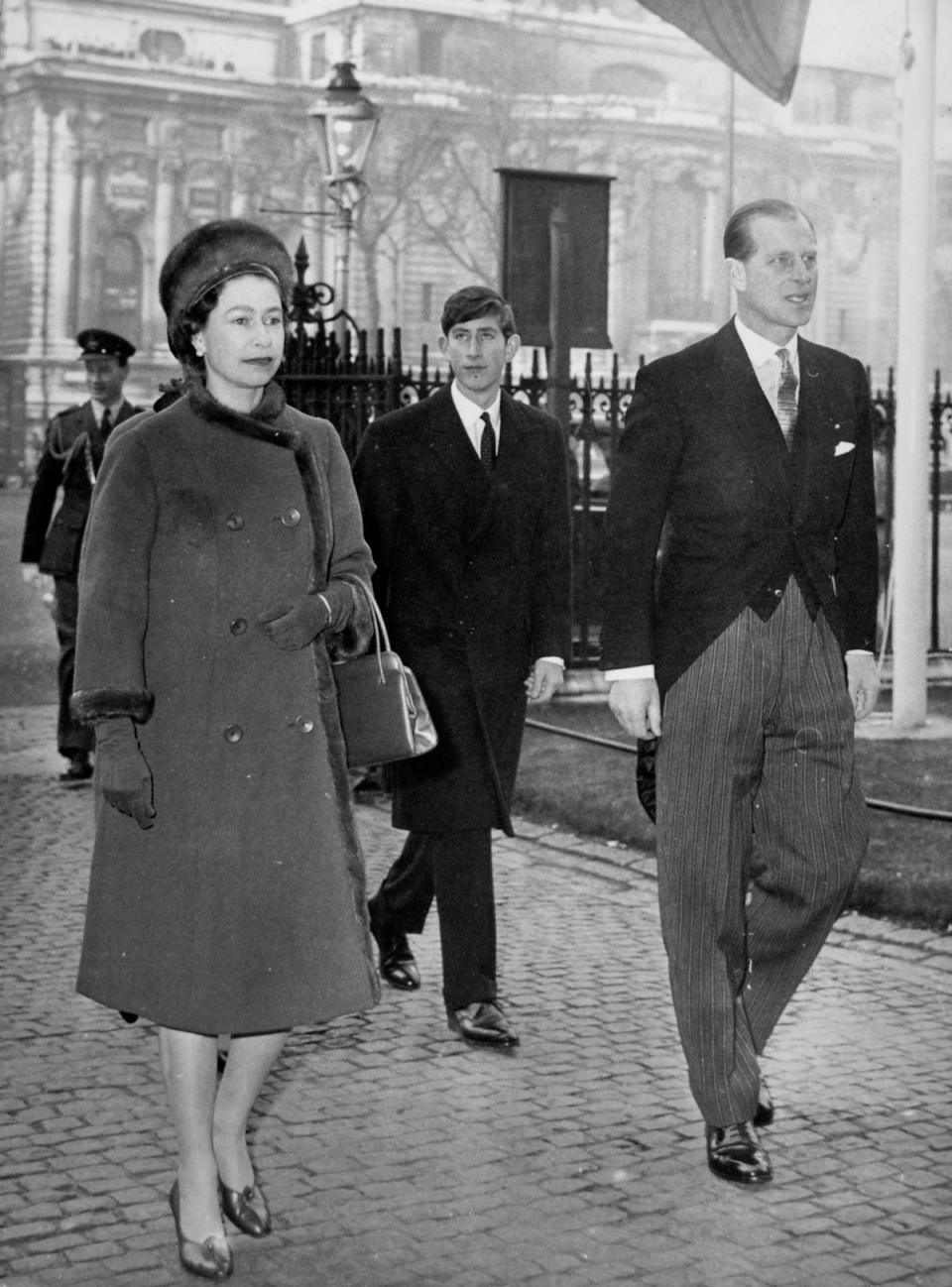 Charles with the Queen and Philip in 1965 (PA) (PA Archive)