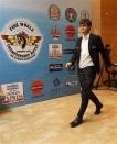 Norway's Magnus Carlsen arrives to play against India's Viswanathan Anand during the FIDE World Chess Championship in the southern Indian city of Chennai November 22, 2013. REUTERS/Babu