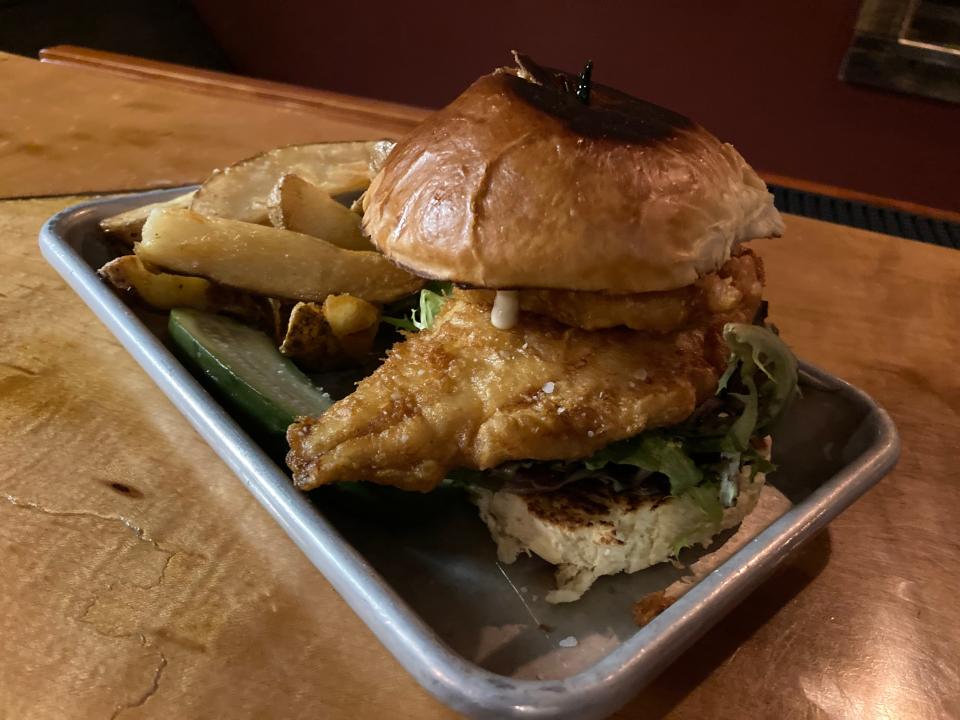 A fish sandwich with fries at Lost Nation Brewing in Morrisville on Jan. 4, 2024.