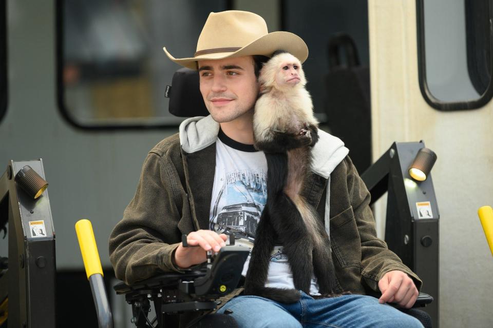 After a near-fatal illness leaves him a quadriplegic, a young man (Charlie Rowe) forms a close bond with his service animal, a capuchin monkey, in the drama "Gigi & Nate."