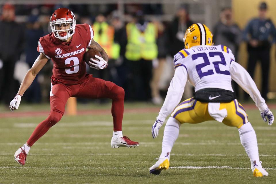 Nov 10, 2018; Fayetteville, AR, USA; Arkansas Razorbacks wide receiver Deon Stewart (3) runs as LSU Tigers cornerback <a class="link " href="https://sports.yahoo.com/nfl/players/32731/" data-i13n="sec:content-canvas;subsec:anchor_text;elm:context_link" data-ylk="slk:Kristian Fulton;sec:content-canvas;subsec:anchor_text;elm:context_link;itc:0">Kristian Fulton</a> (22) defends at Donald W. Reynolds Razorback Stadium. Mandatory Credit: Nelson Chenault-USA TODAY Sports