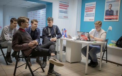 Daniil Zolin, 19, Fyodor Shafranov, 17, Kirill Brodsky, 18, Mikhail Styopin, 20, and Yaroslav Petrov, 19, at the Navalny headquarters in Veliky Novgorod - Credit: Dmitry Beliakov/For The Telegraph