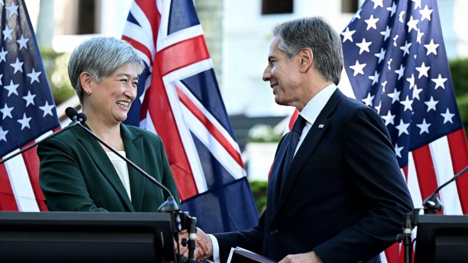 PHOTO: Australian Foreign Minister Penny Wong and US Secretary of State Antony Blinken shake hands as they attend a press conference after the Australia-US Ministerial Consultations (AUSMIN) at Government House in Brisbane, Australia, July 29, 2023. (Darren England/EPA via Shutterstock)