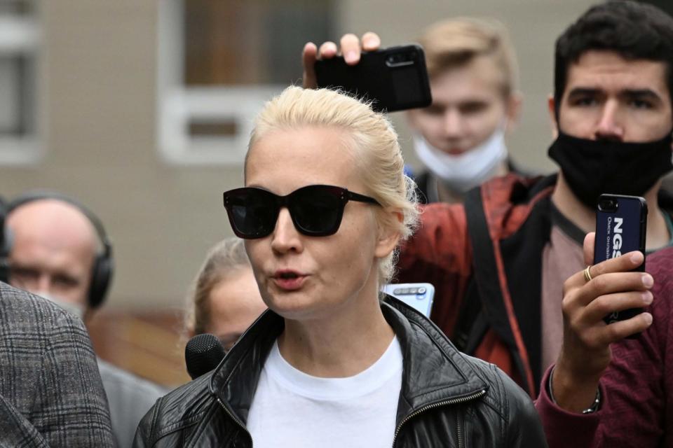 Yulia Navalnaya, wife of Russian opposition leader Alexei Navalny, speaks with the media outside a hospital (REUTERS)