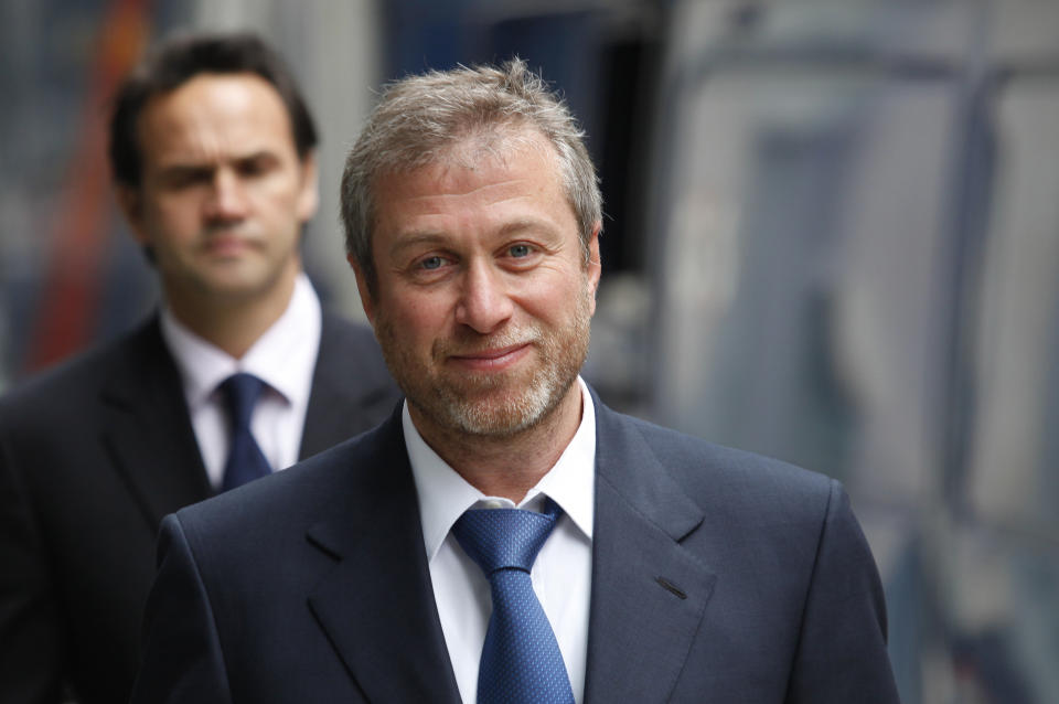 FILE - This Oct. 4, 2011 file photo shows the owner of England's Chelsea Football Club, Russian tycoon Roman Abramovich as he leaves court in London. For the past three decades, many Britons had hoped the rigid class system that defined their country from Dickens to “Downton Abbey” was finally dying. Now they fear that class, their old bugbear, is back on the rise. (AP Photo/Lefteris Pitarakis, File)