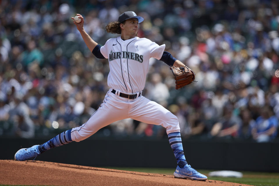 Seattle Mariners starting pitcher Logan Gilbert works against the Los Angeles Angels during the first inning of a baseball game, Sunday, June 19, 2022, in Seattle. (AP Photo/John Froschauer)
