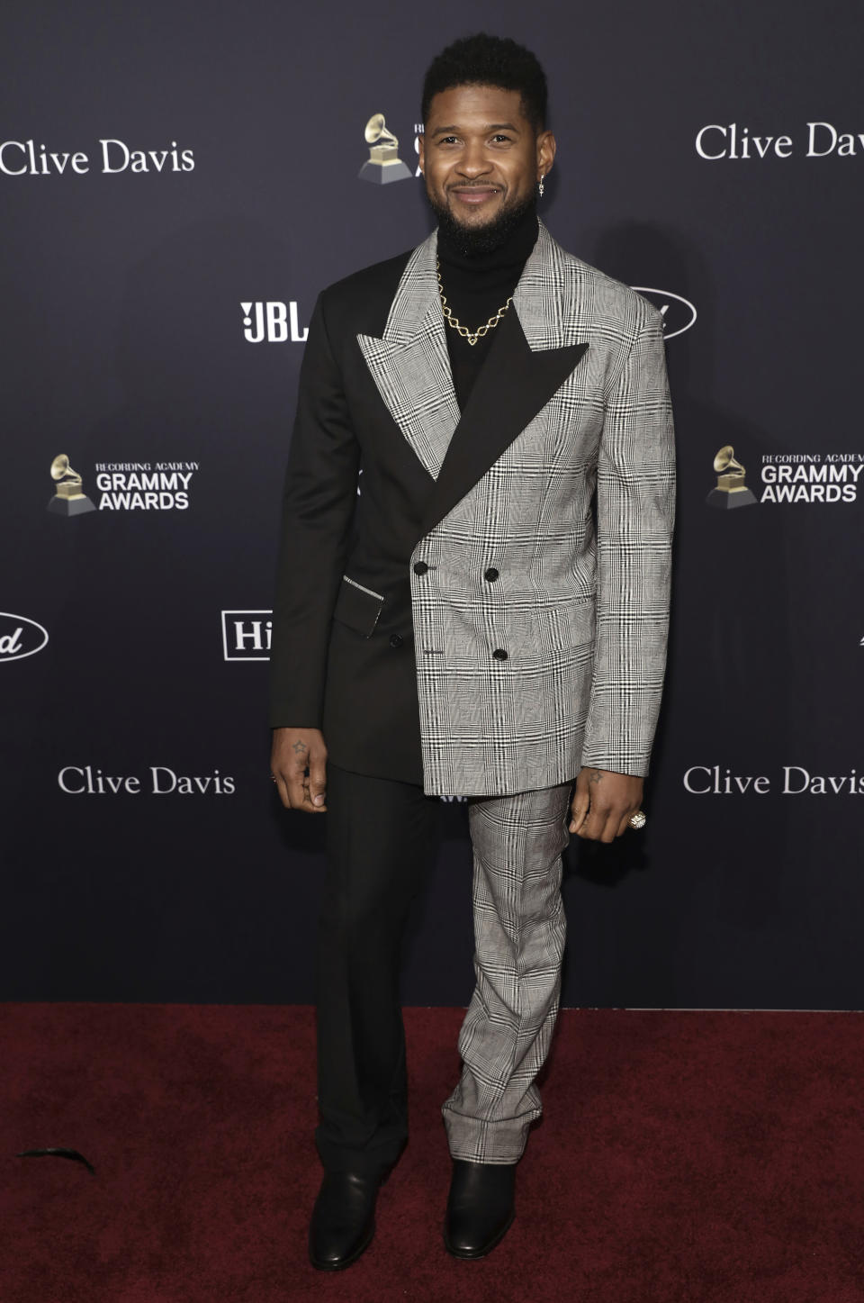 Usher arrives at the Pre-Grammy Gala And Salute To Industry Icons at the Beverly Hilton Hotel on Saturday, Jan. 25, 2020, in Beverly Hills, Calif. (Photo by Mark Von Holden/Invision/AP)