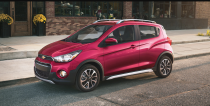 <p>Before you start freaking out that <a rel="nofollow noopener" href="https://www.caranddriver.com/chevrolet/spark" target="_blank" data-ylk="slk:the Chevrolet Spark Activ;elm:context_link;itc:0;sec:content-canvas" class="link ">the Chevrolet Spark Activ</a> isn't a crossover, remember that crossovers, by definition, are simply taller wagons. We’re totally fine lumping the 2019 Chevrolet Spark Activ into this category, after all, check out its particulars: Does it have a higher ride height than a regular Spark? Check. Burly plastic wheel flares? It’s got ‘em. Skidplates? It sort of has those. More importantly, it has kinda sorta resembles a mini crossover and has an EPA rating of 31 mpg combined, so yeah, it gets a spot on our list.</p>